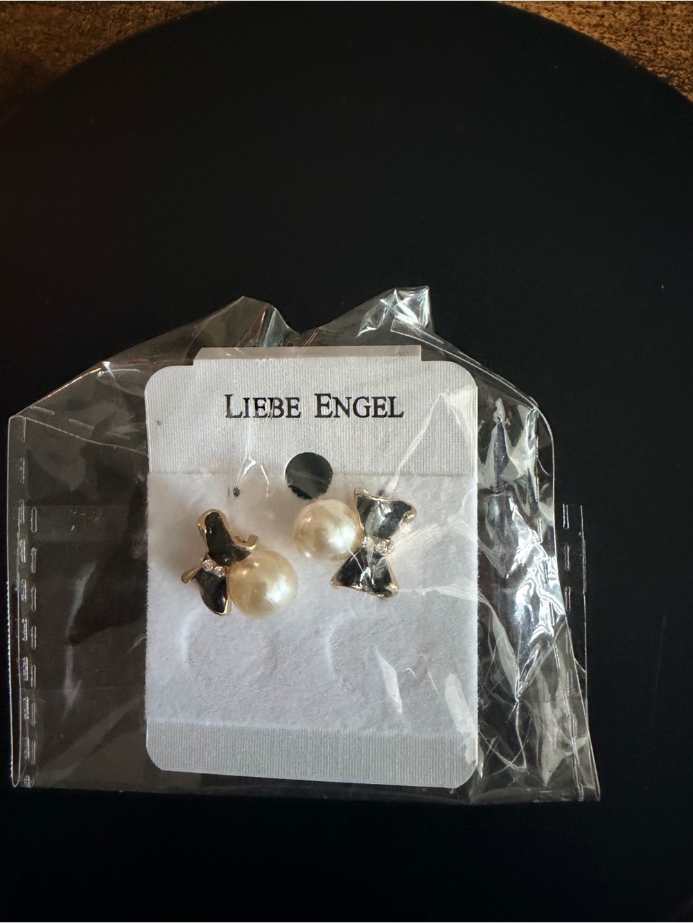 Pearl and Black Bow Stud Earrings